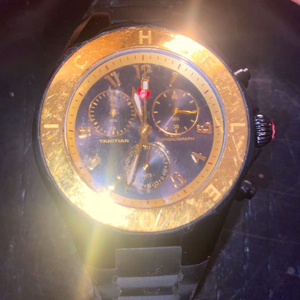 Black and gold micheal kors watch